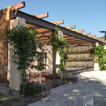 Dense coconut shade sail for pergola
